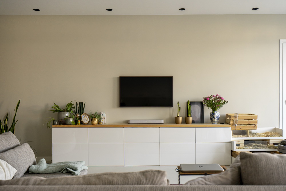 Stuccomeister Pro betonciré wand woonkamer