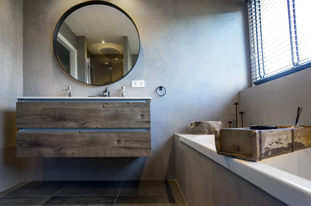 Stuccomeister Rapid betonciré badkamer muur