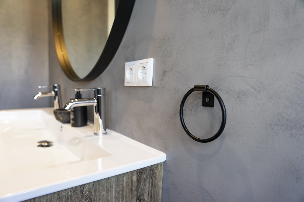 Stuccomeister Rapid betonciré badkamer wand