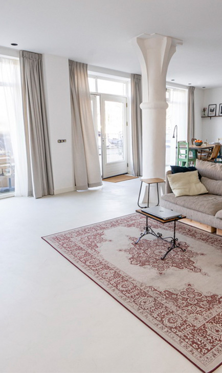 Stuccomeister pro betonciré vloer woonkamer